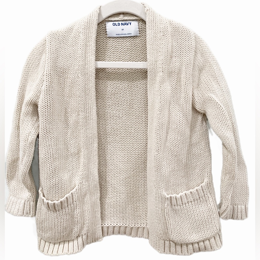 Toddler cream colored open cardigan